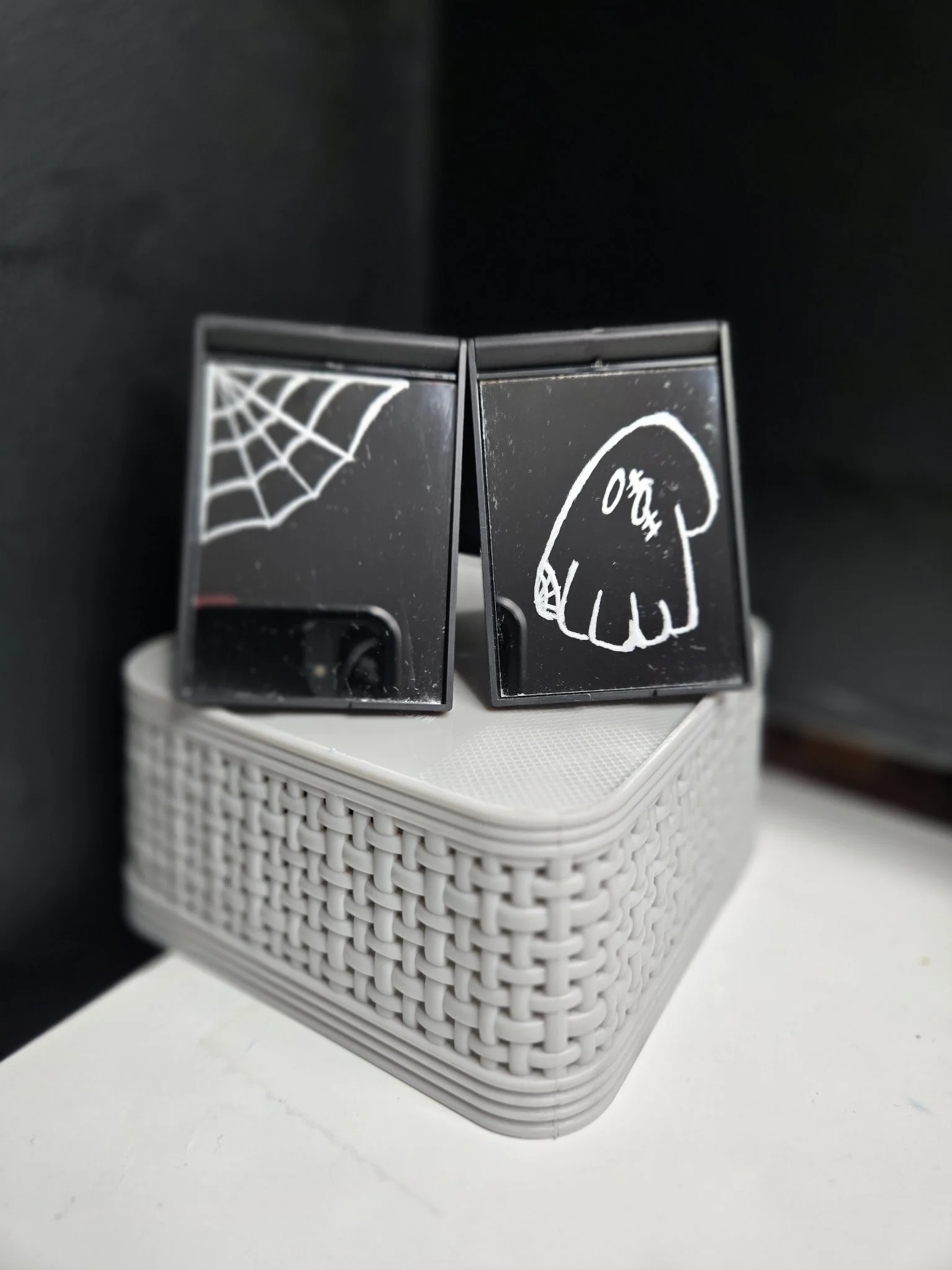 Spiderweb hand-etched on a pocket mirror